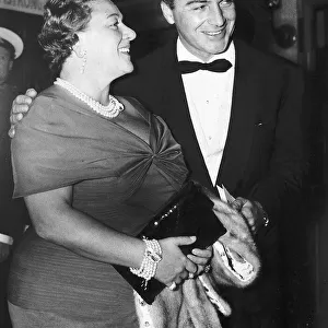 Rossano Brazzi Italian Actor wearing Bow tie and Dinner Jacket. Pictured With his wife