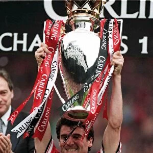 Roy Keane Manchester United Captain May 1999 holding the Premiership Trophy to