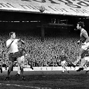 s Norman Dean heads the ball over the head of Hans Schulz towards goal -1st May 1968