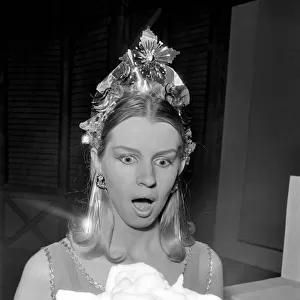 Sara Wade about to have a custard pie thrown at her. January 1970