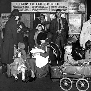 Scene in the queue at Paddington Station, London, for the train to Wales. July 1944