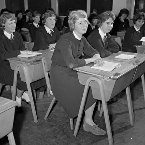 Schoolchildren in a school classroom at Dick Sheppard School Tulse Hill. December 1959