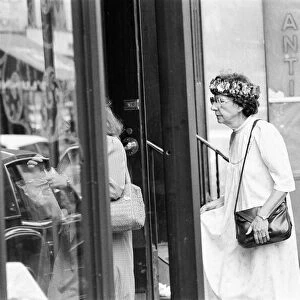 Senior Citizen seen wearing a crown of flowers, New York, USA, June 1984