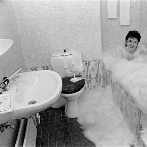 The Sex Pistols in Eindhoven, Holland. Steve Jones in the bath. 11th December 1977