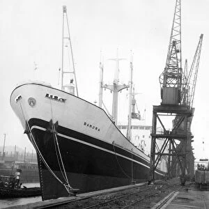 The ship Bamora is seen loading her maiden voyage cargo before she sets out to the wide