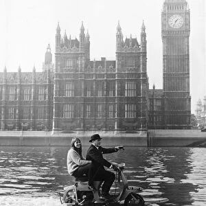 Skipper and stella Hornsby sail up the Thames on their scooter at a fair rate of knots
