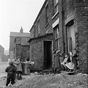 Slum housing in Salford. 3rd April 1960