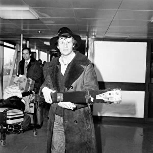 Snooker Champion Alex "Hurricane"Higgins leaving Heathrow airport for
