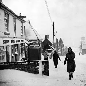 Snowy scenes of Clee Village at the top of Clee Hill, between Ludlow