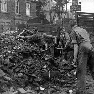 US Soldiers help to clean up the wreckage of the school at Freckleton, Lancashire
