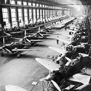 Soviet Yak fighter planes on the assembly line at a factory in Russia during the Second