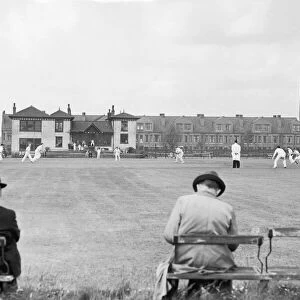 Spectators watching the action at Longsight Cricket Club in Manchester