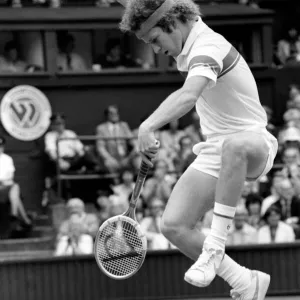 Sport: Tennis. John McEnroe gets an tied up in his Centre Court Wining Wimbledon Semi