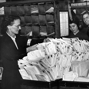 Staff sorting mail at Christmas time. Merseyside. 20th December 1955