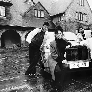 Five Star pop group stand outside mansion in Berkshire with new Rolls Royce. c. 1987