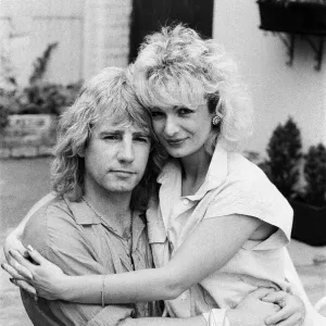 Status Quo band member Rick Parfitt and his new girlfriend Patty Beedon. 12th July 1985