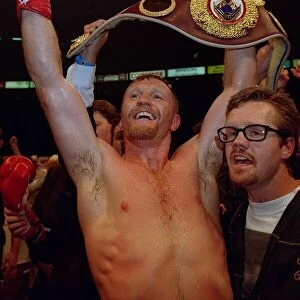 Steve Collins celebrates winning the WBO super middleweight contest by defeating Nigel