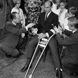 Stirling Moss leaving Atkinson Morley Hospital in Wimbledon