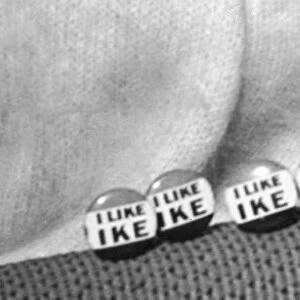 A string of I Like Ike badges The slogan "I Like Ike"was created when Peter G