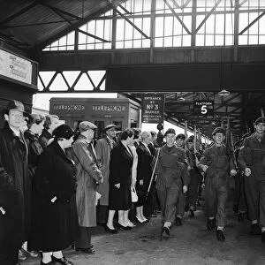 Suez Crisis 1956 Troops march form Portsmouth Train Station to the docks where they