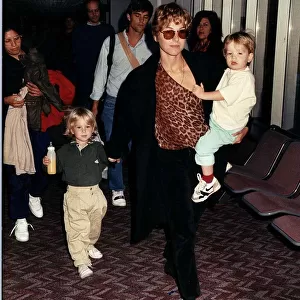 Tatum O Neal wife of Tennis star John McEnroe with her children Kevin