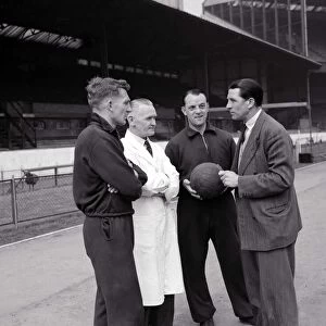 Ted Drake with Chelsea members April 1955