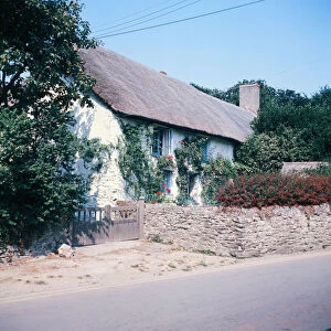 Thatched cottage in Crantock, Cornwall. 19th August 1973