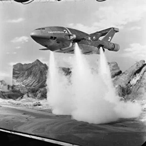 Thunderbird II takes off in Slough film studios during filming of the Thunderbirds series