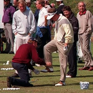 Tony Johnstone holds foot of Lee Westwood July 1998 before he kisses it Open Golf