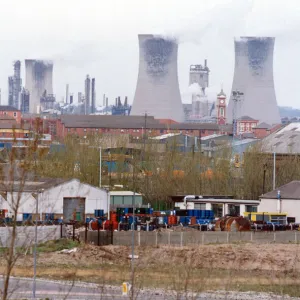 The towers of ICI Billingham across the roofs of St Hildas Estate. 3rd April 1991