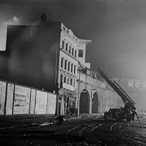 A turntable ladder of the London Fire Brigade tacklest fires close to Waterloo railway