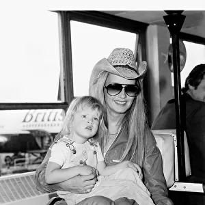 Twiggy actress with her daughter Carly arriving at Heathrow Airport from LA. June 1981