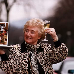 Vera Weisfeld launch her book Recipes for Life toast with glass of champagne leopard skin