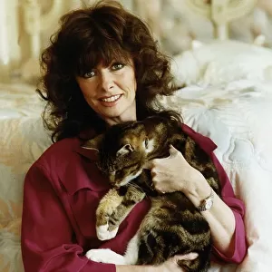 Vicki Michelle Actress Holding cat