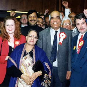 Victorious Labour Party candidates Parshotam Joshi and George Duggins celebrate their