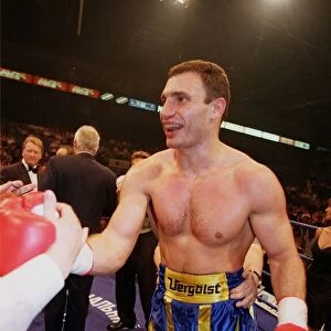 Vitali klitschko smiling after knocking out britians Herbie Hide in two rounds to take