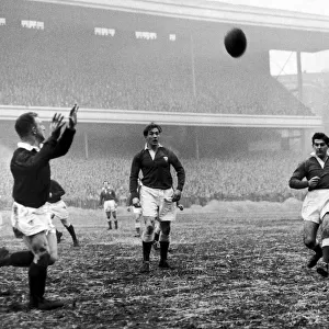 Wales v Scotland - 1956 - Rugby - Wales centre Malcolm Thomas clears to touch under