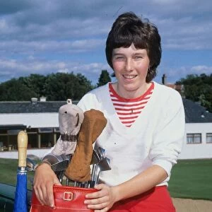 Wilma Aitken Golfer holding golf bag 1980