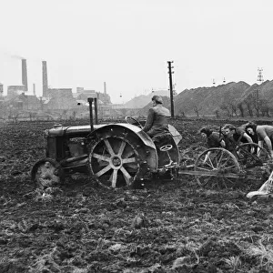 Wives of miners working in Grimethorpe colliery helping to cultivate reclaimed land