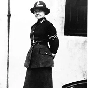 A woman police officer from the 1919 - 1930 era