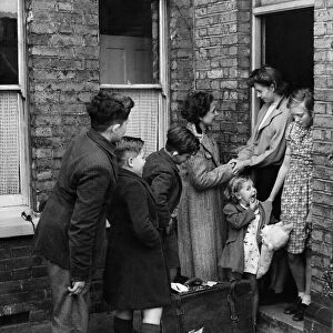 World War II Refugees. The holloway family arriving at home of their fathers sister