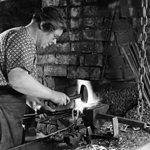 World War II Women. The blacksmiths mother takes over the forge whilst the soldiers are