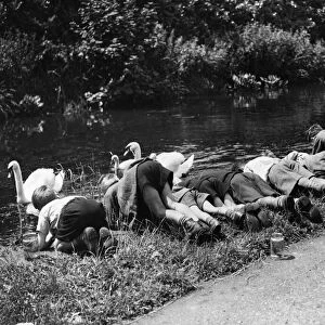 Young boys fishing for "toddlers"in a Glamorgan canal during the Second World