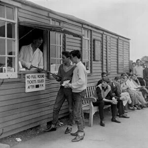 Young people queuing up to play pitch and putt at Ashton Court in 1958