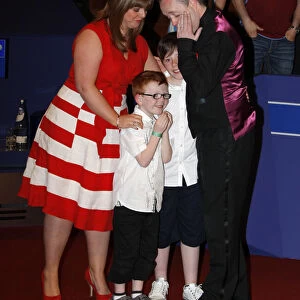 A Tearfull John Higgins With His Wife & Family