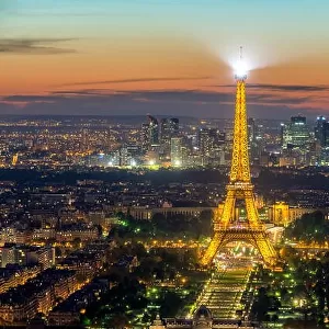 PARIS, FRANCE - May 5, 2016: Beautiful Paris skyline view Eiffel tower during light show at dusk, Paris, France
