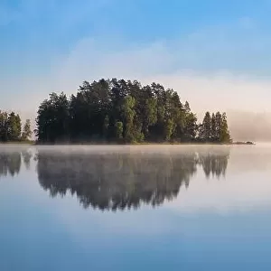 Peaceful and simple view from island at the lake in National Park, Finland