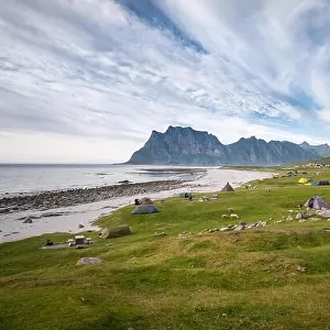 Scenic landscape with mountain and camping area at summer evening in Lofoten Island, Norway