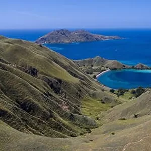Seen from a bird's eye view, the tropical islands within Komodo National Park, Indonesia, are fringed by amazing, biodiverse coral reefs