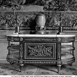 Buffet with bronze ornaments and a marble base, work preserved in the Louvre Museum, Paris